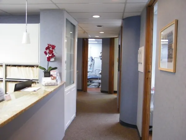 The front desk and the corridor to the treatment rooms at Comprehensive Dental Group.